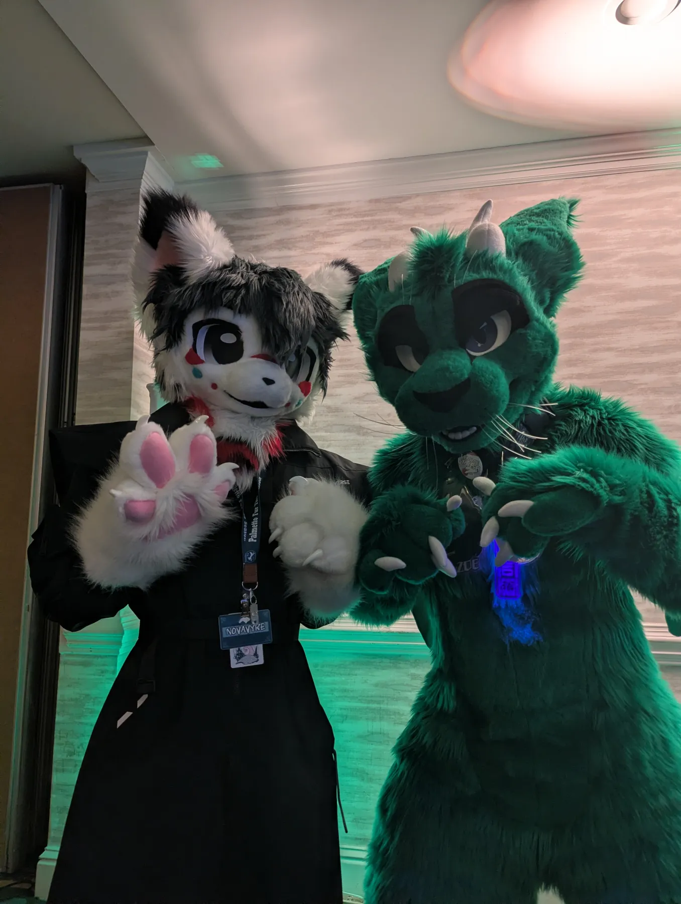 Two fursuiters posing together